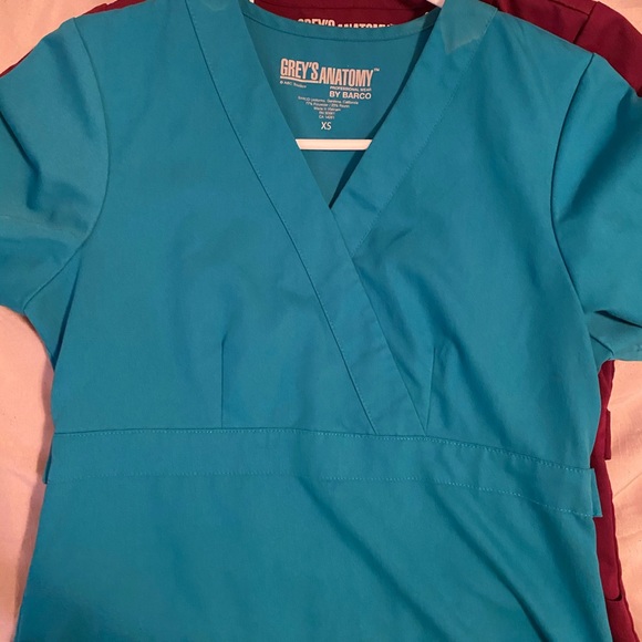 Scrub tops, jacket, and scrub bottoms. - Picture 2 of 5